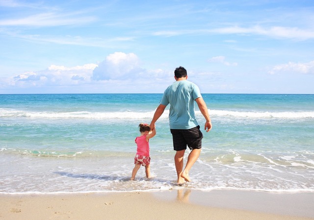 father-daughter-beach-sea-38302.jpg